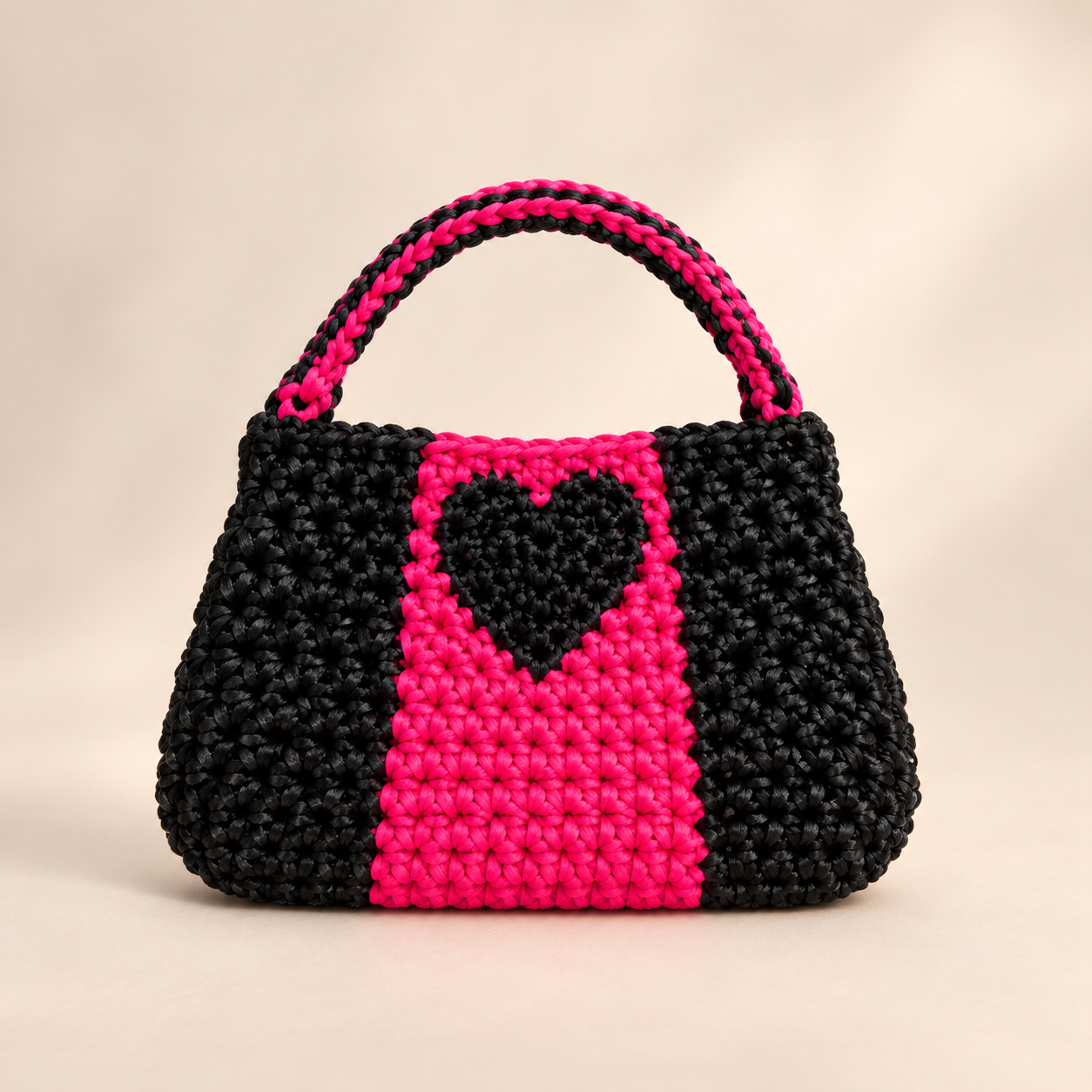 Bella black-and-pink crochet purse