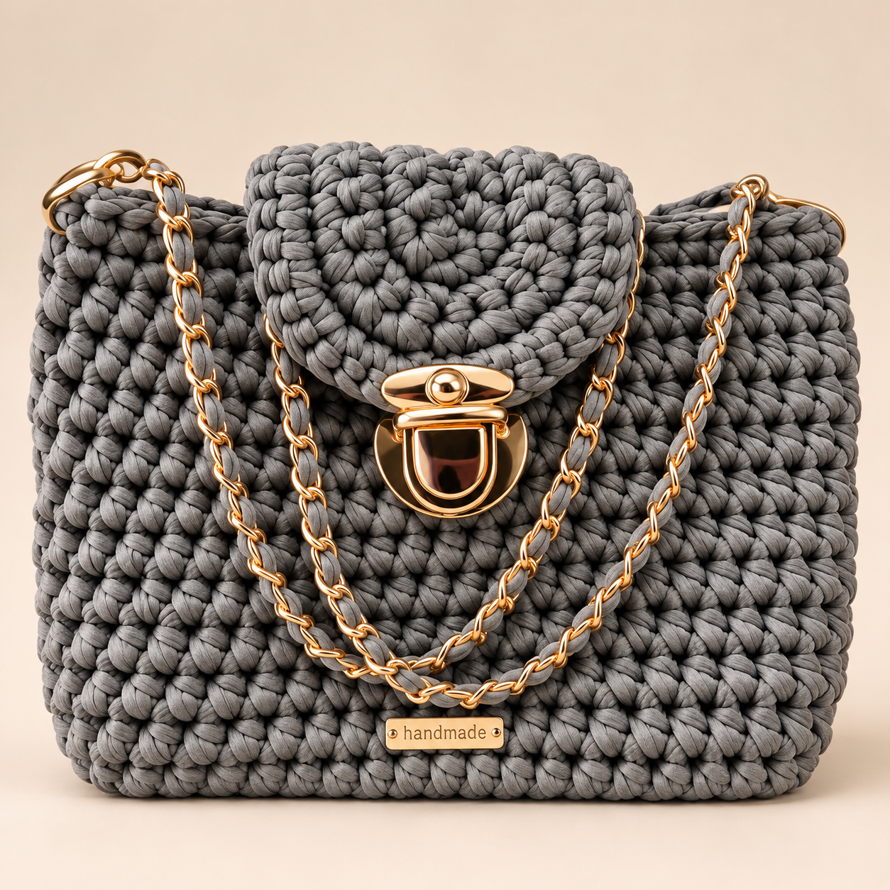 Raygene gray purse with gold-tone clasp and chain