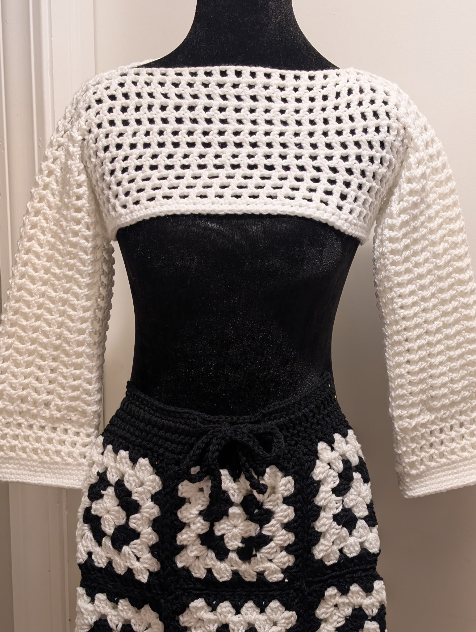Detail of Lola crochet top and drawstring skirt waist